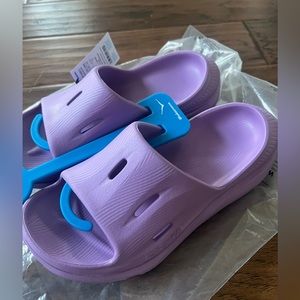 HOKA purple recovery slides